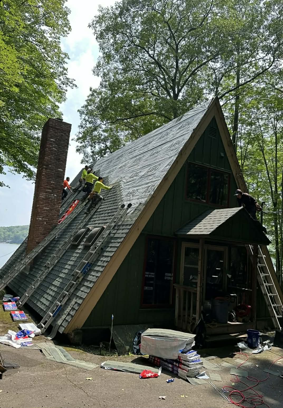 Top roofing professionals working on roof repair projects